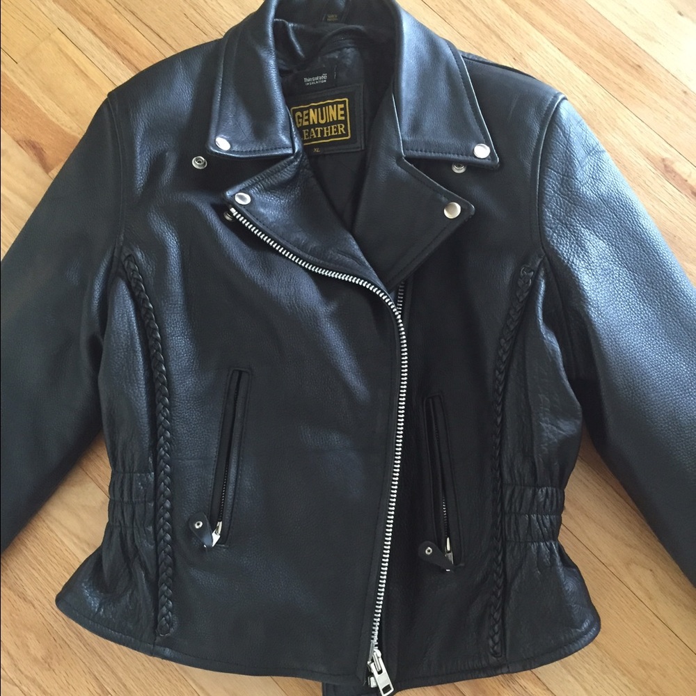 Beautiful heavy leather jacket.  Girls XL/Adult SM